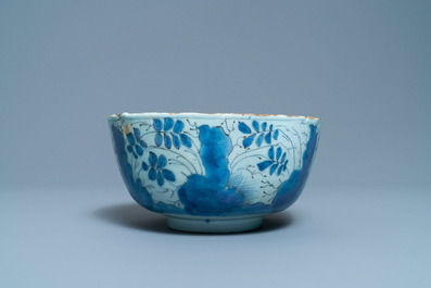 A blue and white English Delftware bowl dated 1684