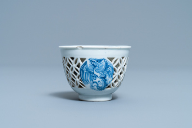 A rare Chinese blue and white reticulated double-walled 'fenix' cup, Transitional period