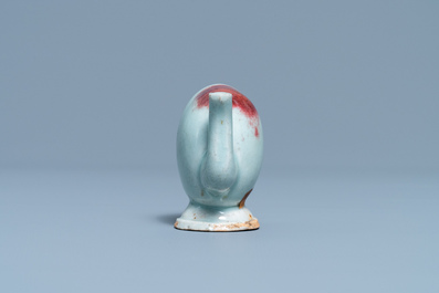 A Chinese miniature peach-shaped cadogan teapot with junyao glaze, Kangxi/Qianlong