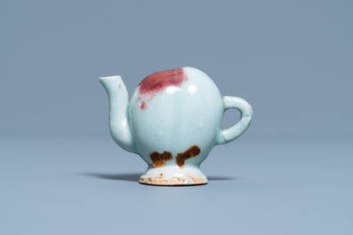 A Chinese miniature peach-shaped cadogan teapot with junyao glaze, Kangxi/Qianlong