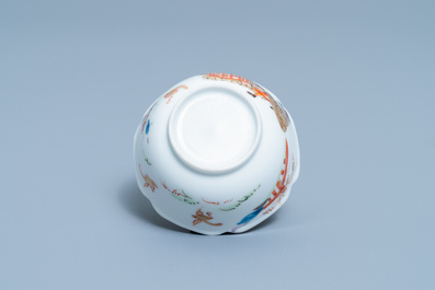 A Chinese cup and saucer with a design after Cornelis Pronk, Yongzheng/Qianlong