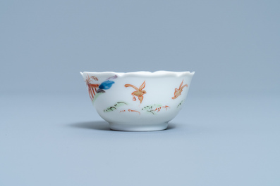 A Chinese cup and saucer with a design after Cornelis Pronk, Yongzheng/Qianlong