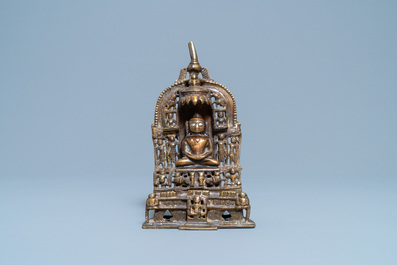 An inscribed silver- and brass-inlaid gilt bronze Jain shrine, India, 18/19th C.