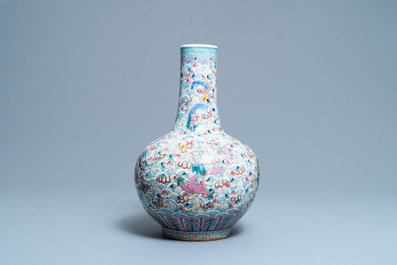 A Chinese famille rose bottle vase with dragons, 19th C.
