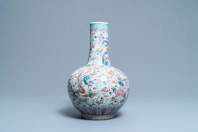 A Chinese famille rose bottle vase with dragons, 19th C.