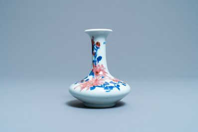 A small Chinese blue, white and underglaze red bottle vase with floral design, Republic