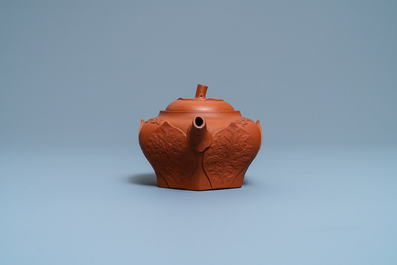 A Chinese Yixing stoneware lotus-shaped teapot and cover, Kangxi