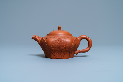 A Chinese Yixing stoneware lotus-shaped teapot and cover, Kangxi