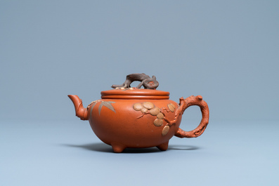 A Chinese Yixing stoneware 'Three friends of winter' teapot and cover, Kangxi