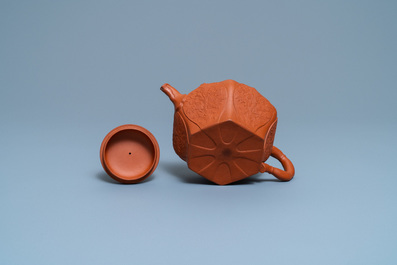 A Chinese Yixing stoneware lotus-shaped teapot and cover, Kangxi