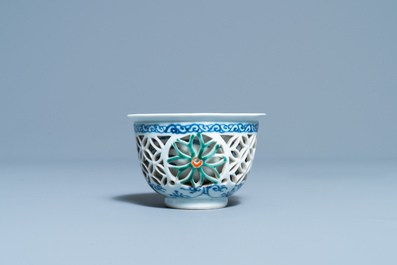 A rare Chinese famille verte reticulated double-walled cup, Kangxi