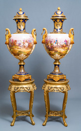 A pair of massive French S&egrave;vres-style vases with gilt bronze mounts, signed Desprez, 19th C.
