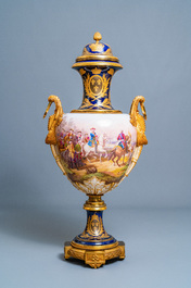 A pair of massive French S&egrave;vres-style vases with gilt bronze mounts, signed Desprez, 19th C.