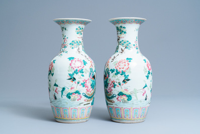 A pair of Chinese famille rose 'phoenix' vases, 19th C.