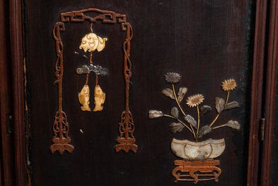 A Chinese lacquered wooden screen embellished with bone, wood and various stones, 18/19th C.