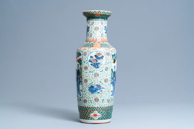 A Chinese famille verte rouleau vase with ladies in a garden, 19th C.