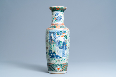 A Chinese famille verte rouleau vase with ladies in a garden, 19th C.