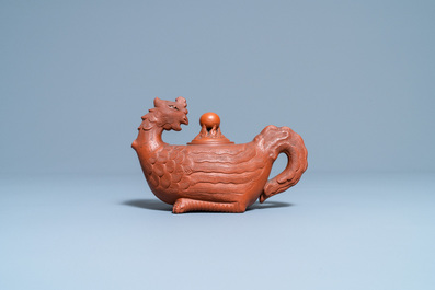 A Chinese Yixing 'phoenix' stoneware teapot and cover, Kangxi