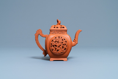 A Chinese reticulated Yixing stoneware teapot and cover, Kangxi