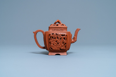 A Chinese reticulated Yixing stoneware teapot and cover, Kangxi