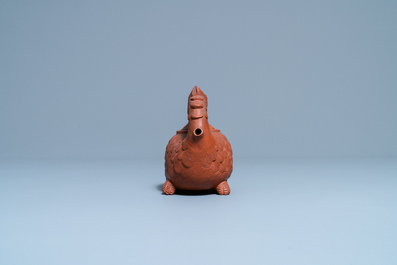 A Chinese Yixing 'phoenix' stoneware teapot and cover, Kangxi