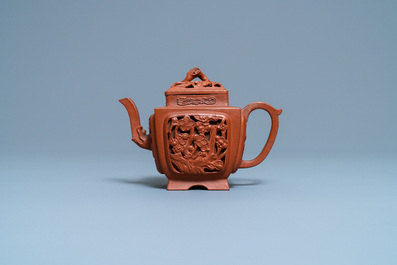 A Chinese reticulated Yixing stoneware teapot and cover, Kangxi