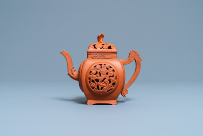 A Chinese reticulated Yixing stoneware teapot and cover, Kangxi