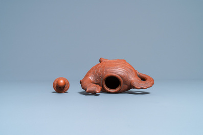 A Chinese Yixing 'phoenix' stoneware teapot and cover, Kangxi