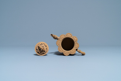 A Chinese reticulated Yixing stoneware teapot and cover, Kangxi