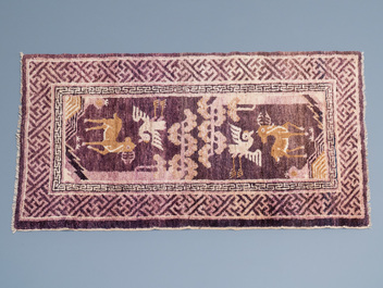 Two Chinese rectangular woollen carpets, 19/20th C.