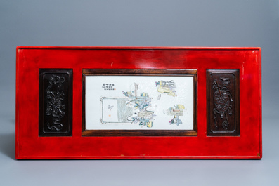 A Chinese qianjiang cai plaque mounted in a wooden table, 19/20th C.