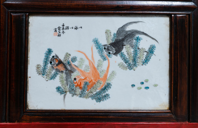A Chinese qianjiang cai plaque mounted in a wooden table, 19/20th C.