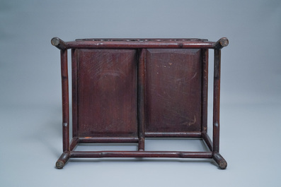 A Chinese wooden display cabinet, 19th C.