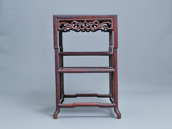 A Chinese wooden display cabinet, 19th C.