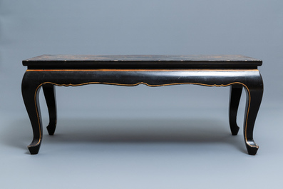 A Chinese rectangular lacquered wood table for the European market, 19th C.