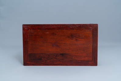 Deux tables 'kang' de forme rectangulaire en bois sculpt&eacute;, Chine, 19/20&egrave;me