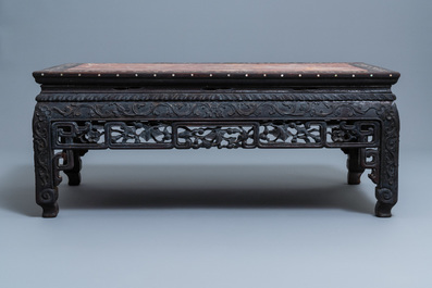 A Chinese mother-of-pearl-inlaid wooden low side table with marble top, 19th C.