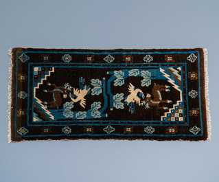Two Chinese rectangular woollen carpets, 19/20th C.
