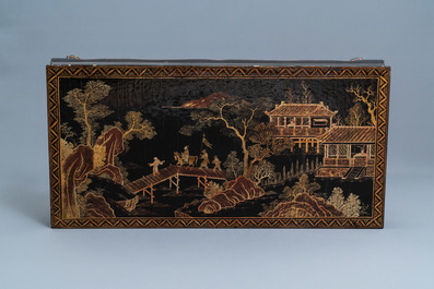 A Chinese rectangular lacquered wood table for the European market, 19th C.