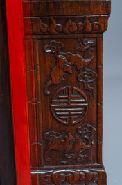 A Chinese qianjiang cai plaque mounted in a wooden table, 19/20th C.