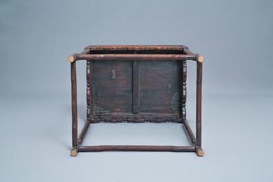 Three Chinese wooden nesting side tables, 19th C.