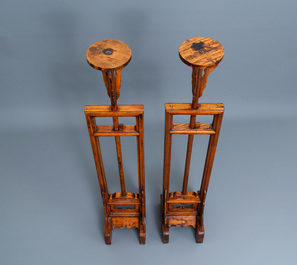 A pair of Chinese wooden lamp stands, 19th C.