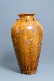 A large Chinese brown-glazed relief-molded martaban jar with dragons, Qing