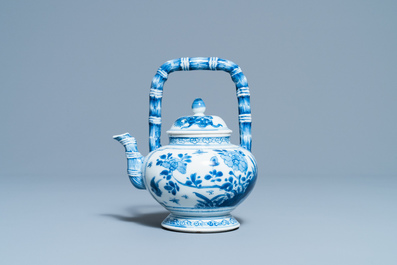 A Chinese blue and white teapot with bamboo-shaped spout and handle, Kangxi