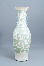 A massive Chinese relief-decorated celadon-ground 'dragon' vase, 19th C.