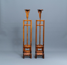 A pair of Chinese wooden lamp stands, 19th C.