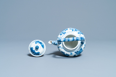 A Chinese blue and white teapot with bamboo-shaped spout and handle, Kangxi