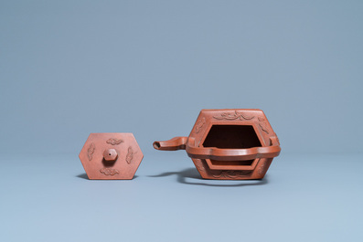 A Chinese Yixing stoneware teapot and cover, Kangxi