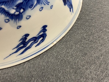 A Chinese blue and white 'dragon and carps' bowl, Xuande mark, Kangxi
