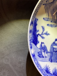 A Chinese blue and white plate with figures in a landscape, Yonzheng mark and of the period